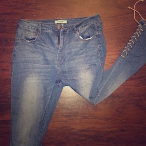 Light denim skinny jeans with tie up the bottom